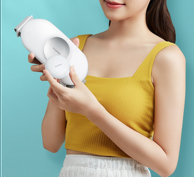 Woman holding a white electronic device against a blue background