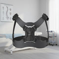 Black chest harness on a light gray background